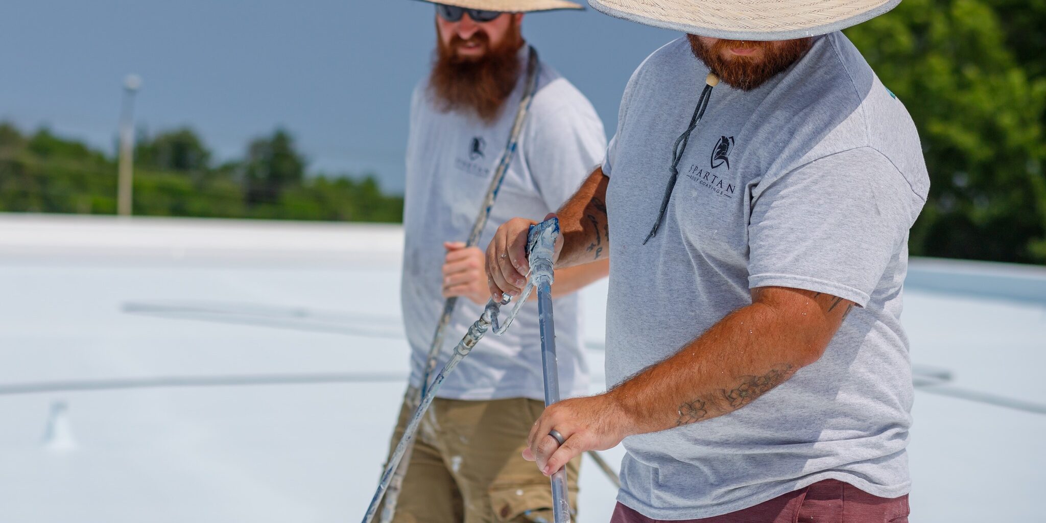 Two men together on a roof