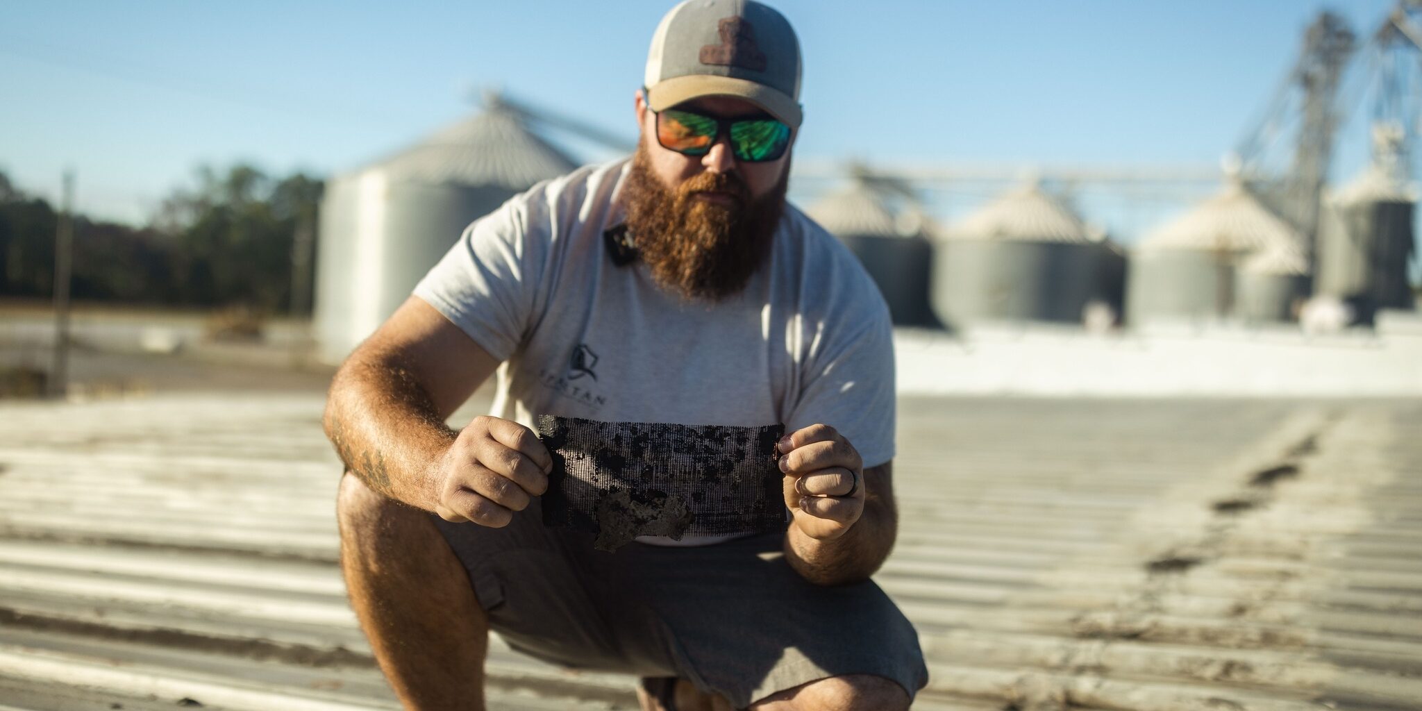 Man holding a mesh panel