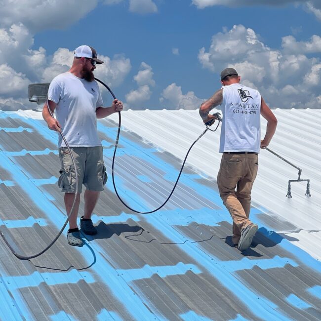 men working on a roof Men working on a roof