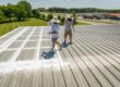 Men spraying roof