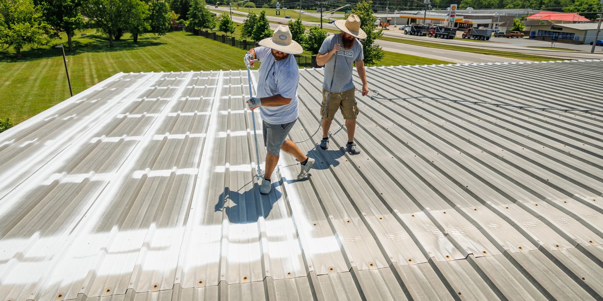 men spraying roof pt 2 Men spraying roof