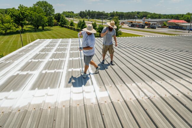 men spraying roof pt 2 Men spraying roof